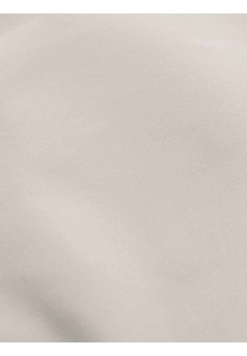 Lässige hellbeige Bomberjacke