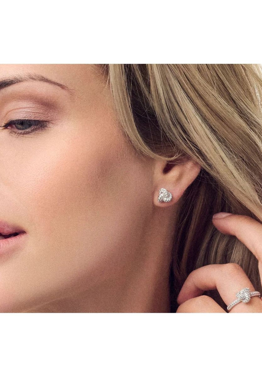 Silberne Knotenohrstecker mit Zirkonia