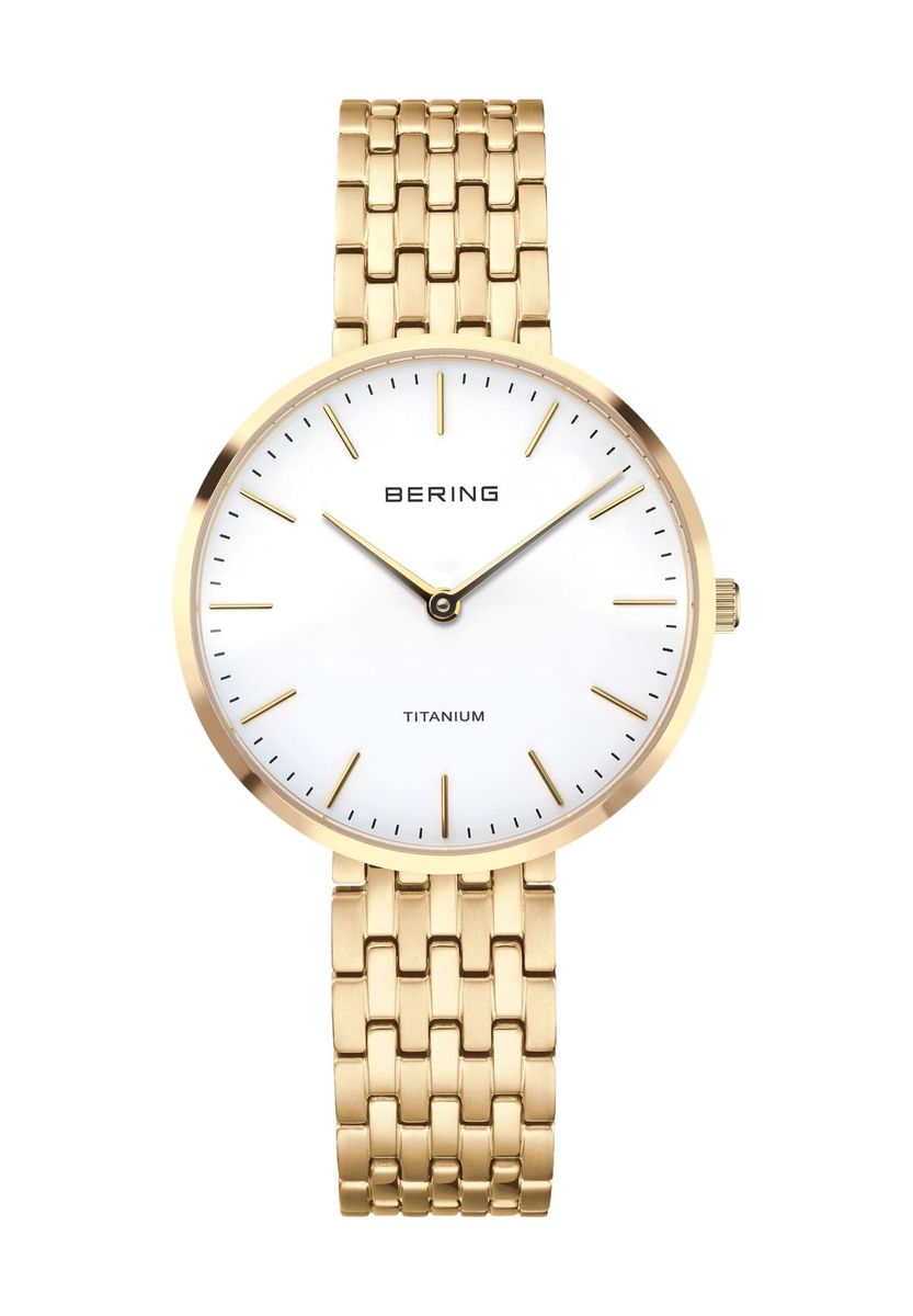 Elegante goldfarbene, minimalistische Damenuhr