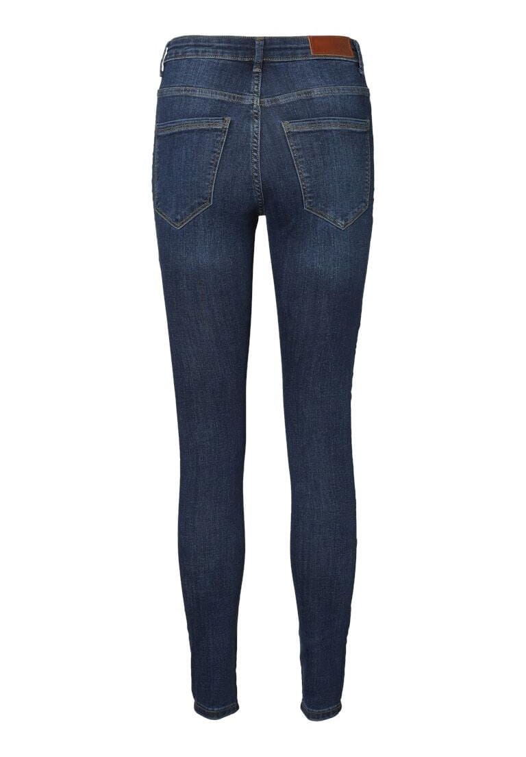 Dunkle Waschung, hochgeschnittene Skinny Jeans