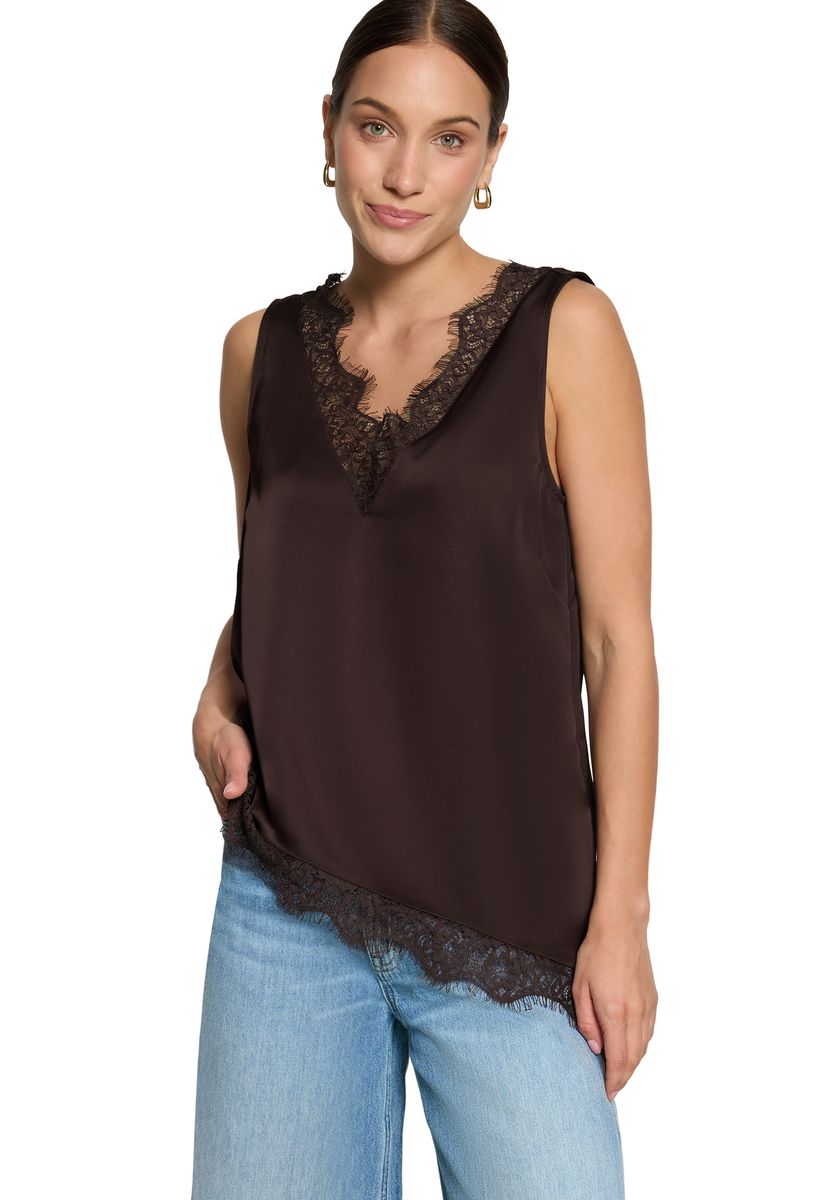 Satinbluse mit Spitzenbesatz und asymmetrischem Saum