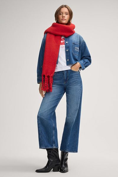 Kurz geschnittene Jeansbluse mit Fransensaum