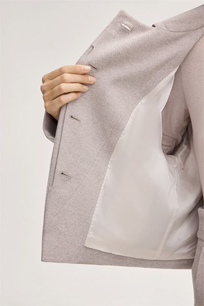 Moderne asymmetrische Jersey-Kurzblazer-Jacke