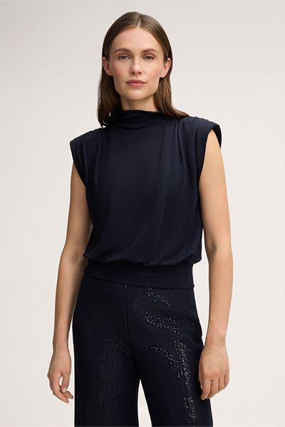 Elegantes ärmelloses Top mit Schulterpolstern