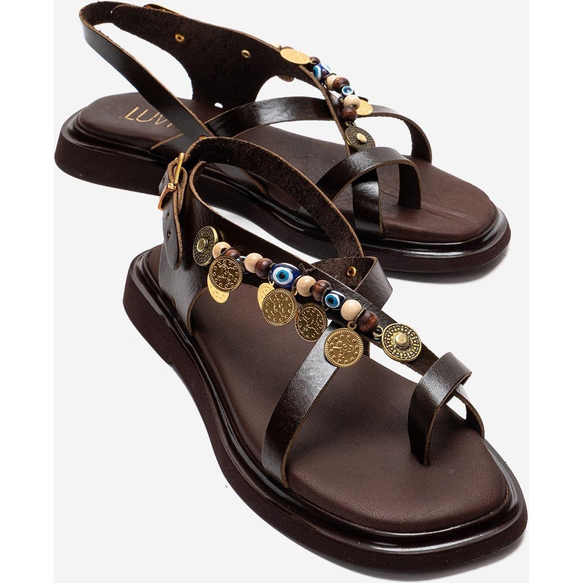 Handwerklich verzierte Leder-Riemensandalen