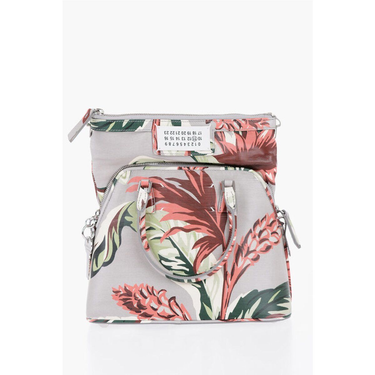 Schultertasche mit Blumenmuster und Henkel