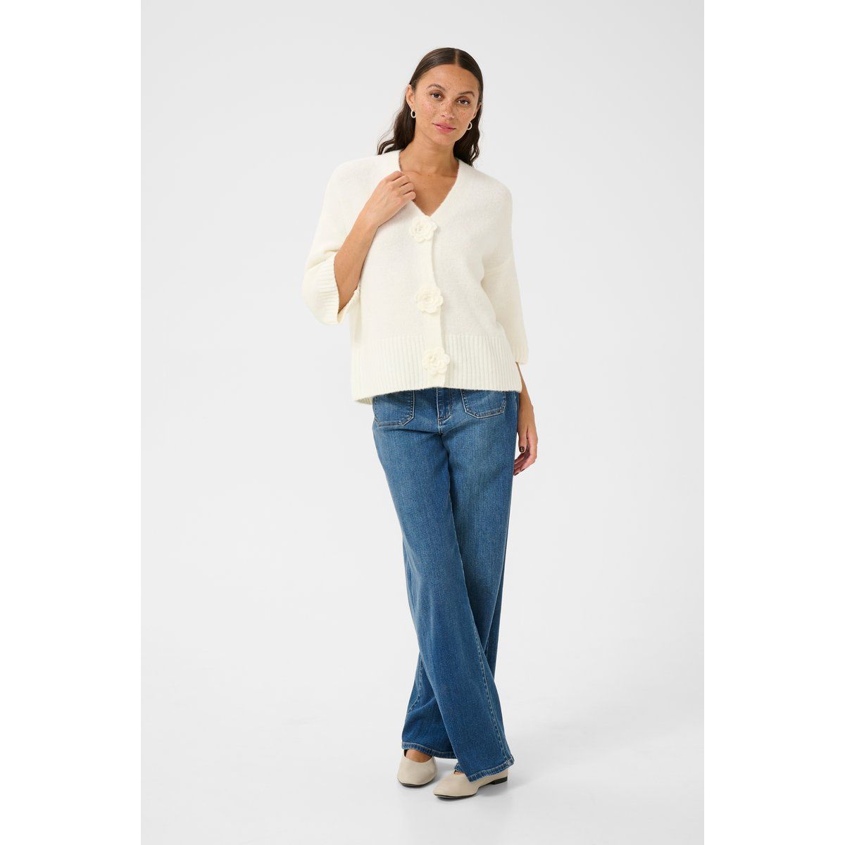 Elegante Strickjacke mit floralen Applikationen