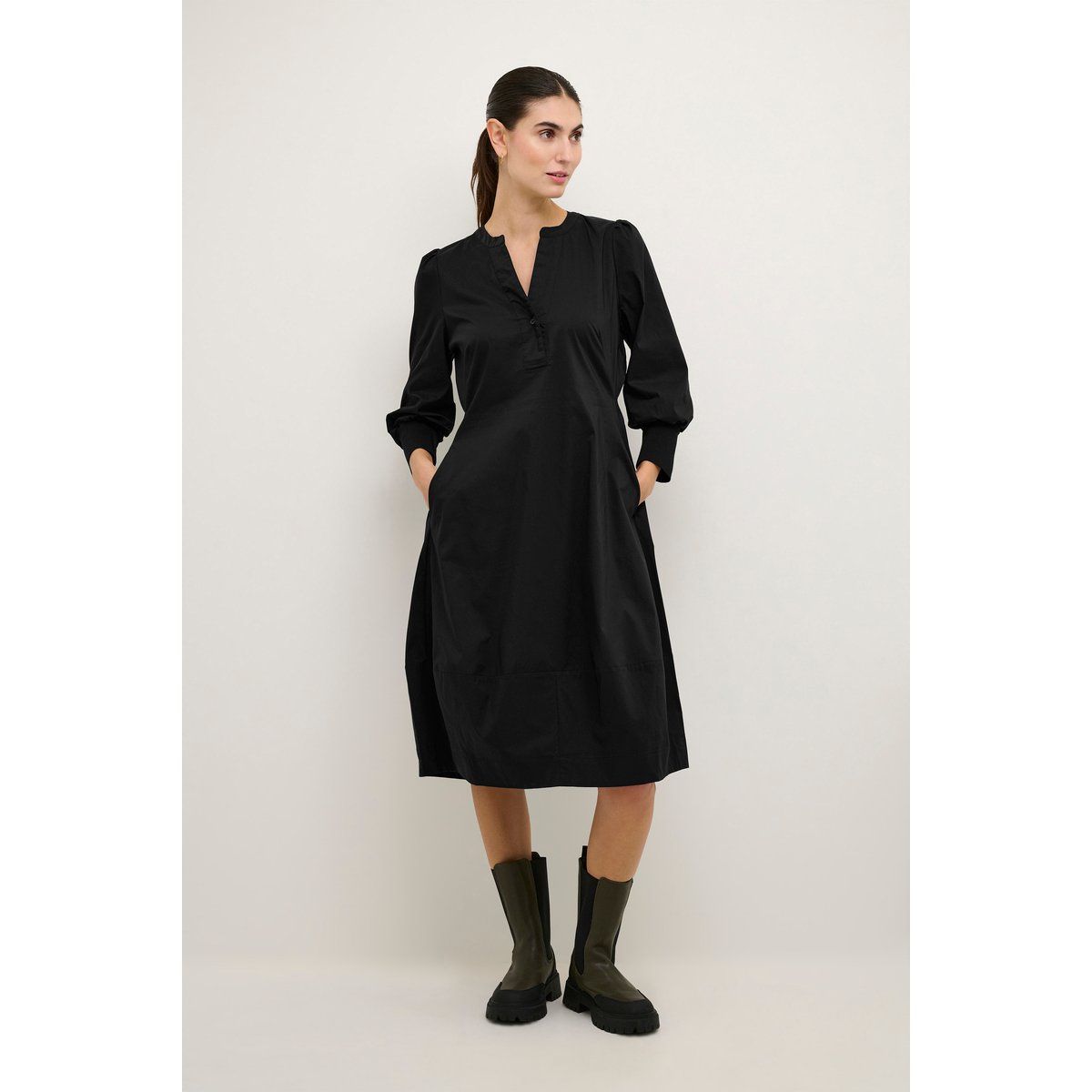 Elegantes Midikleid mit Taschen