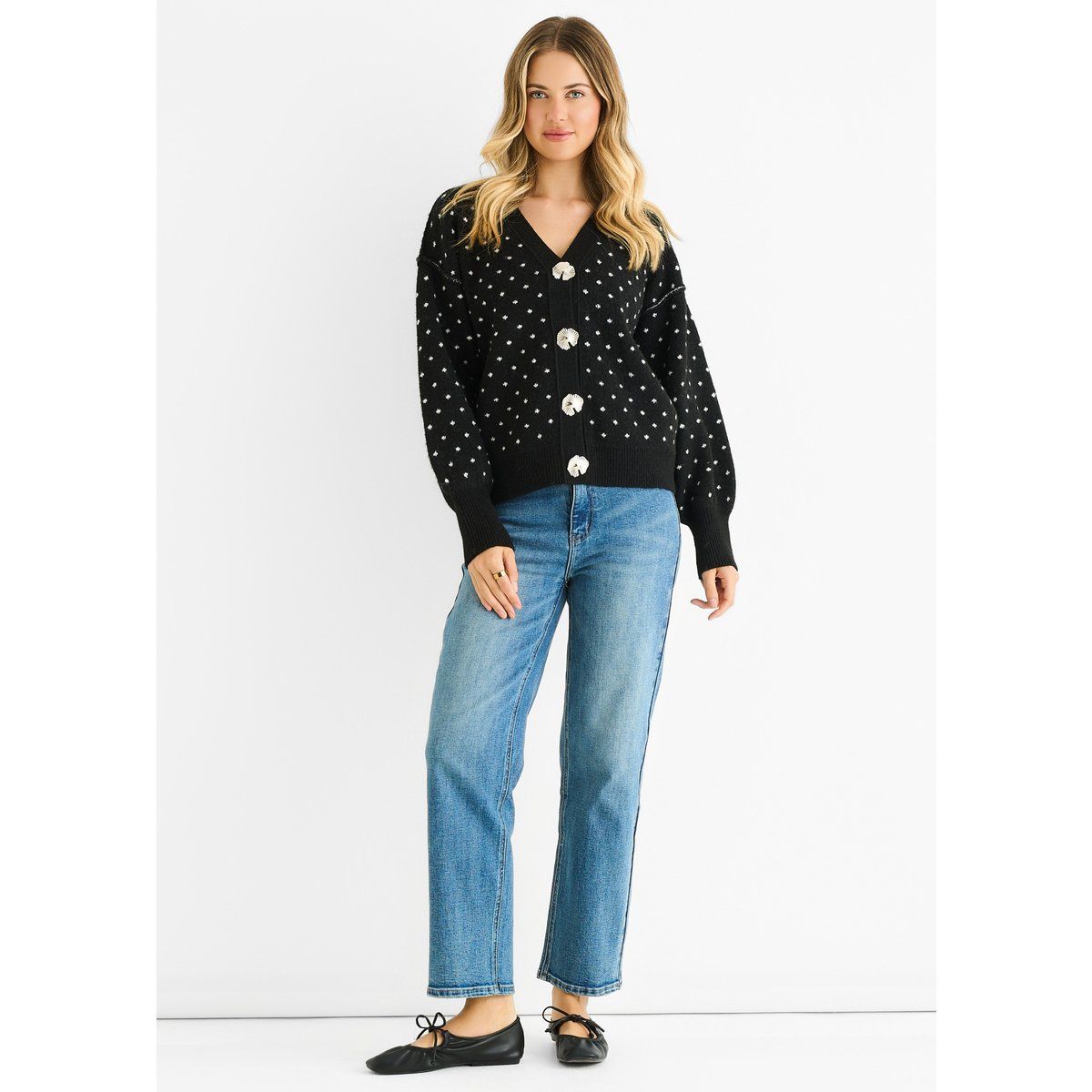 Schwarze Strickjacke mit Punktmuster und Knopfleiste