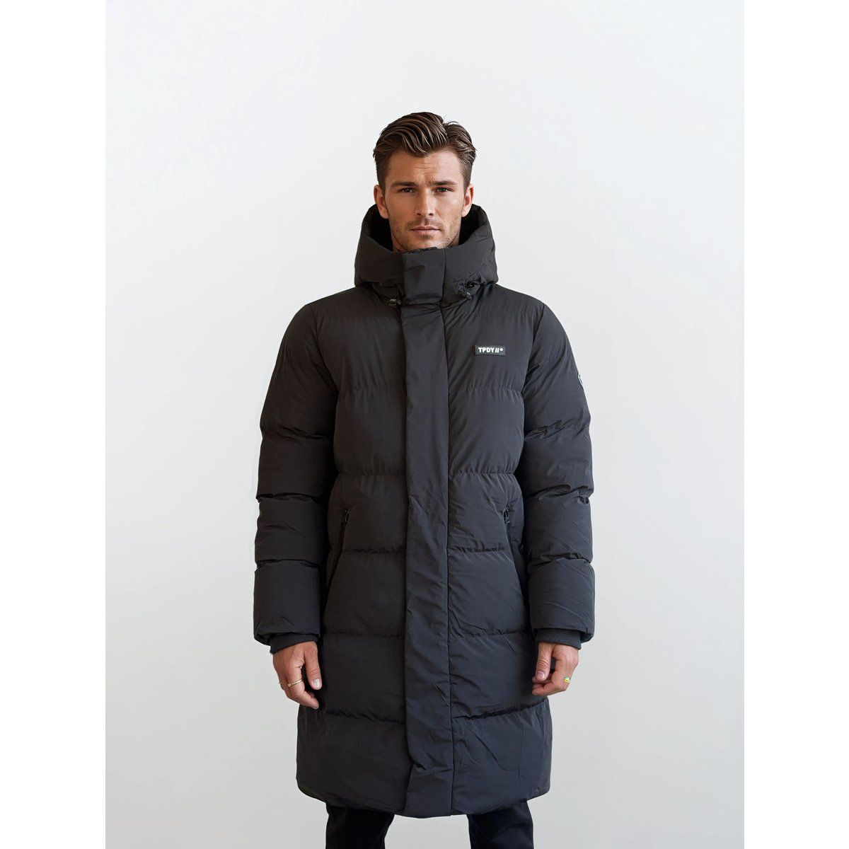 Lange Gesteppte Pufferjacke mit Kapuze