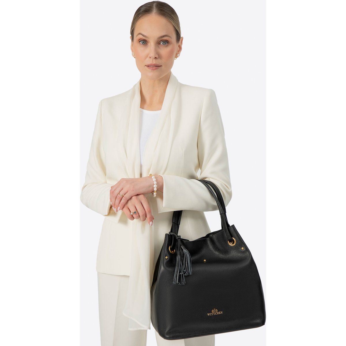 Elegante Leder-Beuteltasche mit Quaste