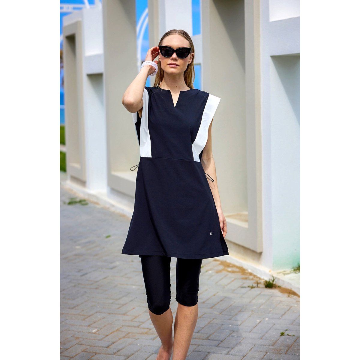 Bescheidenes Schwimm-Tunika- und Leggings-Set