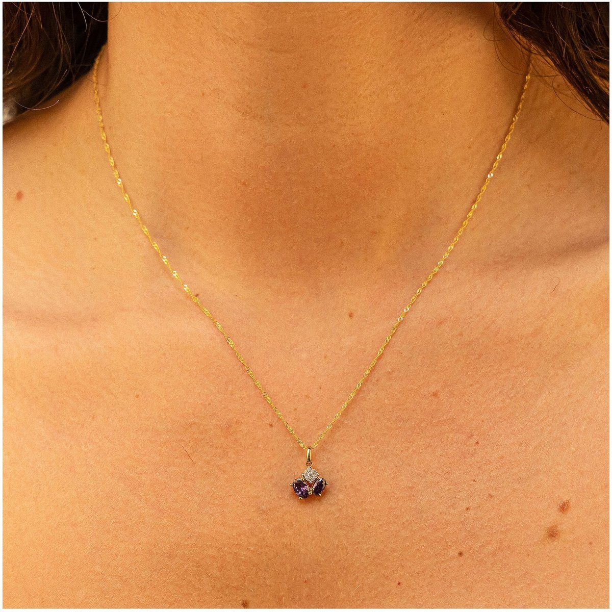 Goldkette mit Amethyst-Schmetterling